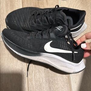 CLEAR OUT Nike Black and White Athletic Shoes with Cushioned Comfort